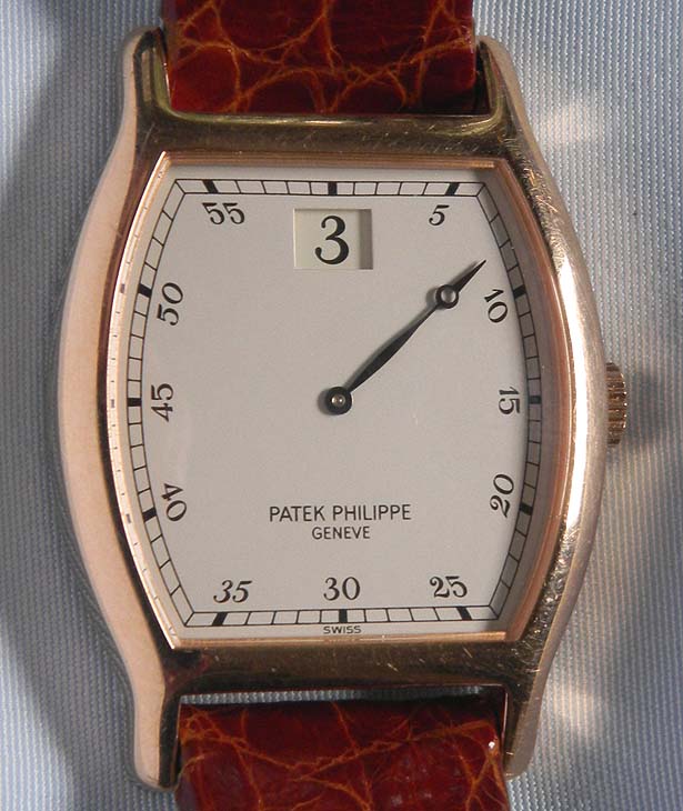   Patek Philippe 18K pink gold jump hour reference 3969 
150th Anniversary wrist watch circa 1989.   