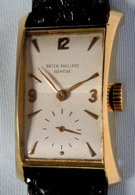  Fine Patek Phillippe 18K gold reference 
2468 Hourglass vintage wrist watch circa 1961.  