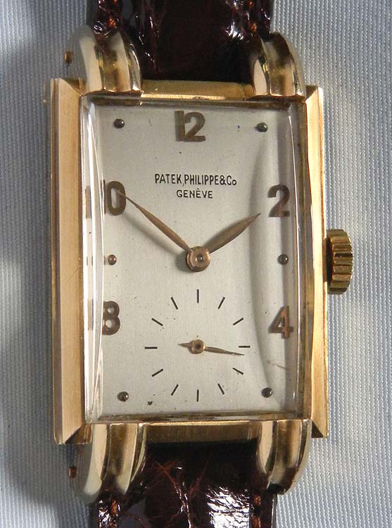  Fine Patek Philippe 18K gold reference 1480 vintage wrist watch circa 1943  